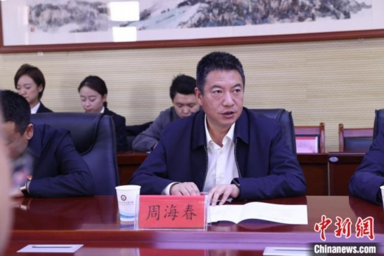 圖為西寧城市職業(yè)技術學院黨委書記周海春發(fā)言。青海省人民檢察院供圖