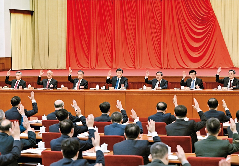 中國共產(chǎn)黨第二十屆中央委員會第二次全體會議，于2023年2月26日至28日在北京舉行。這是習(xí)近平、李強(qiáng)、趙樂際、王滬寧、蔡奇、丁薛祥、李希等在主席臺上。 新華社記者 謝環(huán)馳/攝