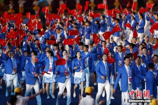 資料圖：9月23日，杭州第19屆亞運會開幕式舉行。中國代表團身著星辰藍禮服驚艷亮相。<a target='_blank' href='/'><p align=