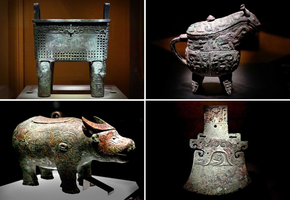這是殷墟博物館新館內(nèi)展出的“司母辛”銅鼎（左上）、“亞長(zhǎng)”銅觥（右上）、“亞長(zhǎng)”牛尊（左下）、“亞長(zhǎng)”銅鉞（拼版照片，2月23日攝）。